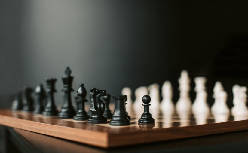 black and white chess pieces on chess board